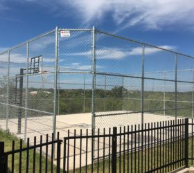 Boyd Fence & Welding installs chain link fence in Abilene, Texas.